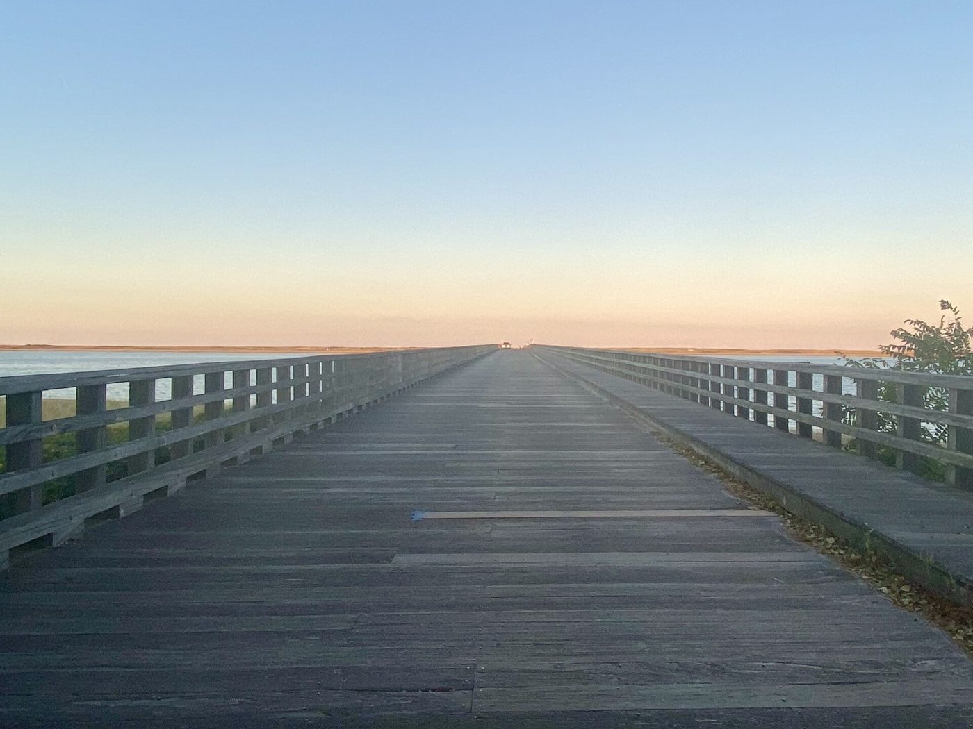 Duxbury Beach from the Powder Point Bridge. A playground in Duxbury now carries touchstones for each of the three Clancy children.
